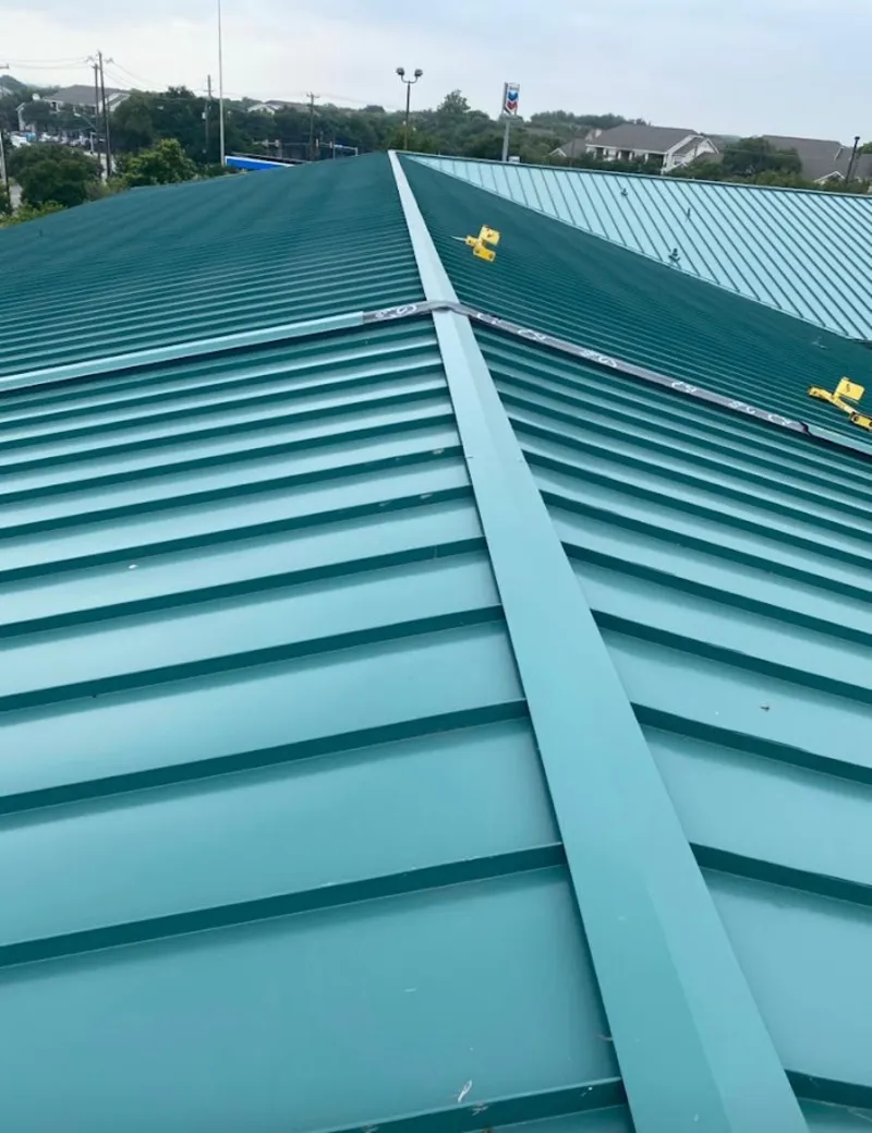 Green commercial metal roof ridge and valley for Metal Roof Repair in San Juan Capistrano