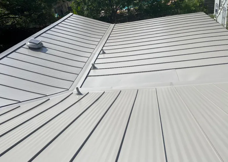 Solar attic fan installed on a metal roof for Roof Ventilation in San Juan Capistrano
